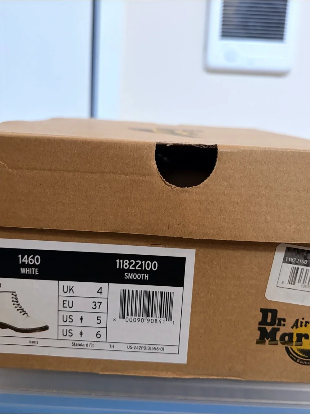 Dr. Martens White Leather 8-Eye Lace-Up Boots with Yellow Stitching